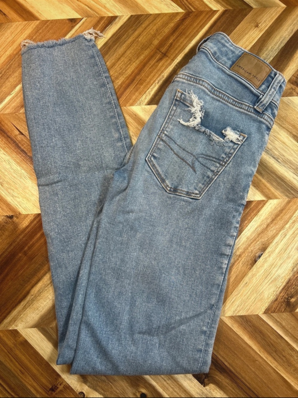 American Eagle Outfitters Light Wash Skinny Jeans with Frayed Pocket